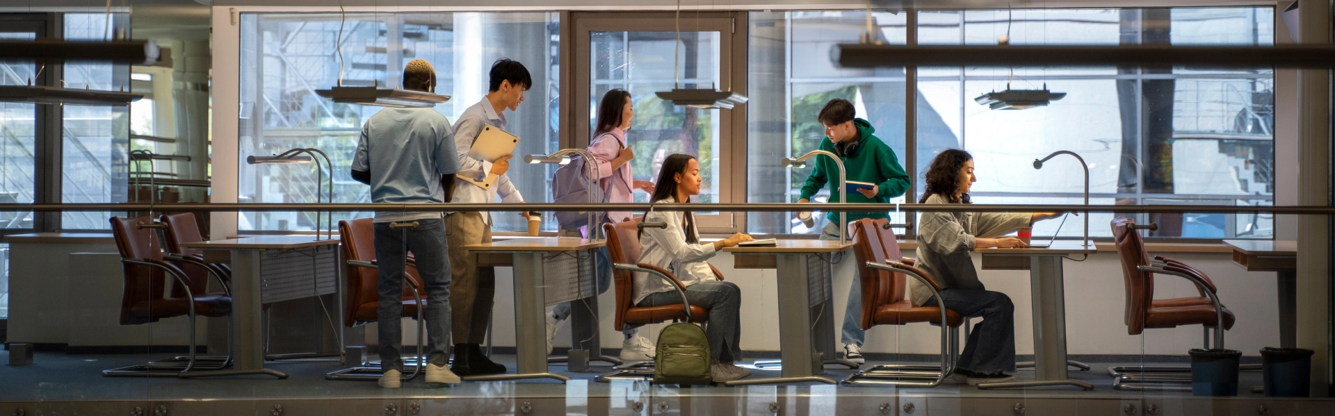 Higher education professionals collaborating in university workspace